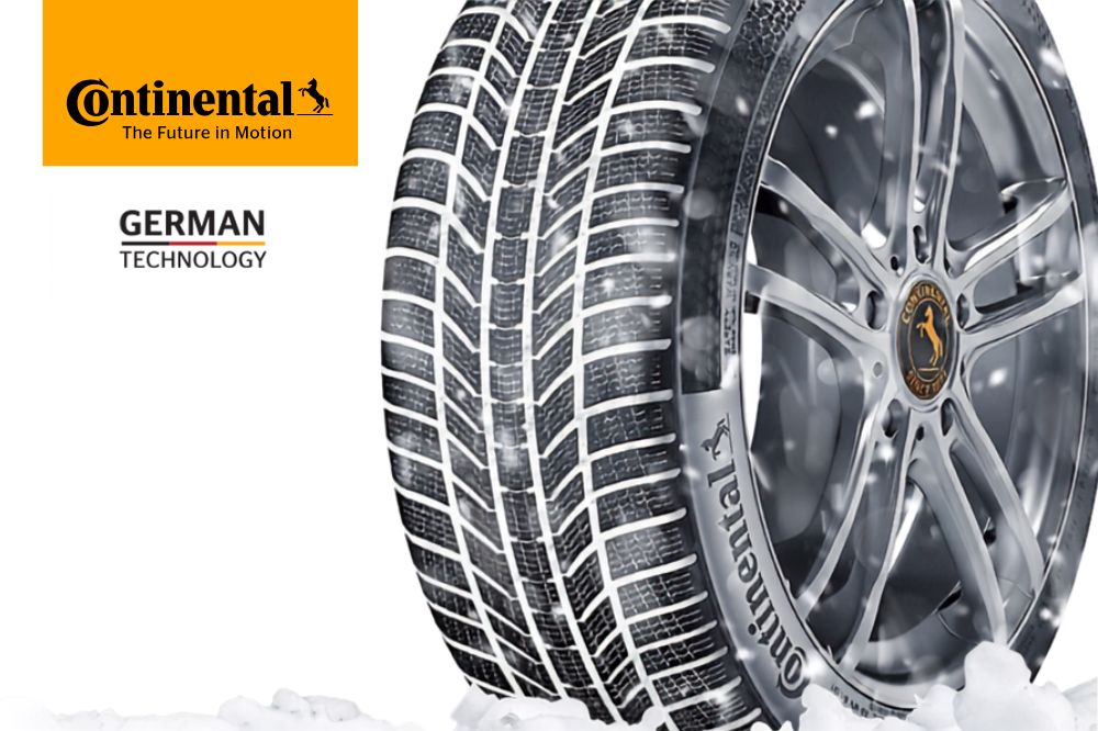 Zimn&iacute; pneu Continental v detailu se sněhem v dr&aacute;žk&aacute;ch