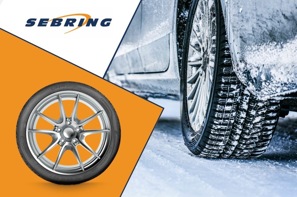 Detail pneumatiky na zasněžen&eacute; cestě a kola s lit&yacute;m diskem v grafice Sebring